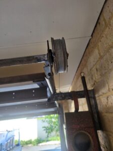 Cable drum and torsion tube on a sectional garage door in Ellenbrook, Perth