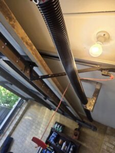 New torsion spring fitted on a sectional garage door in Ellenbrook