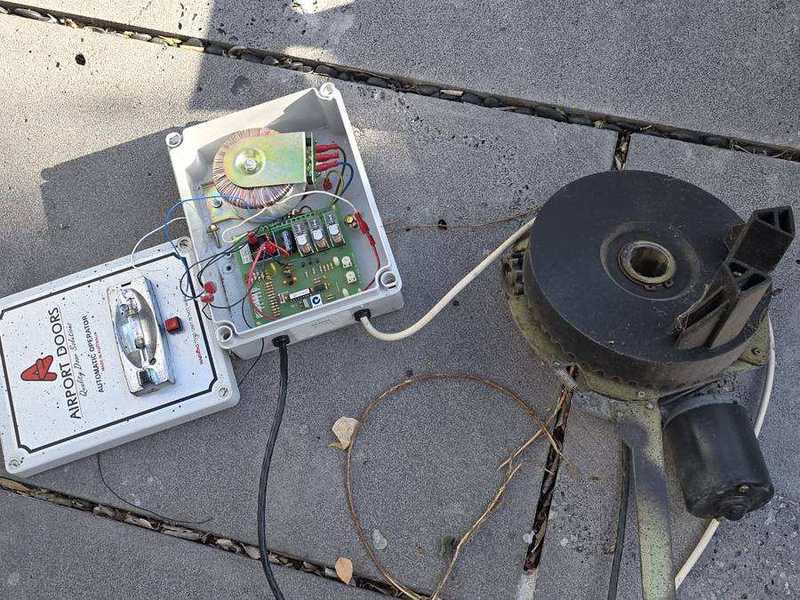 Old Airport Doors motor and control board removed during replacement in Elwood, Melbourne