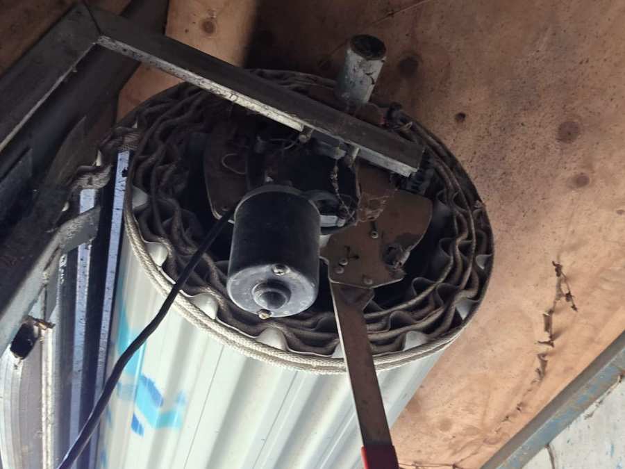 Old roller door motor before replacement in Elwood, Melbourne