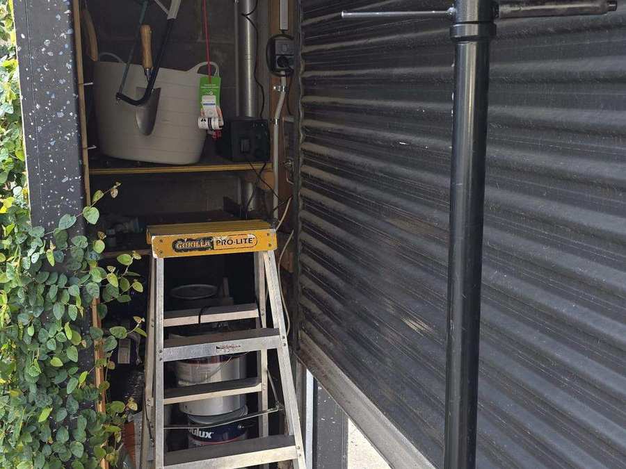 Exterior view of residential roller door during motor replacement in Elwood, Melbourne