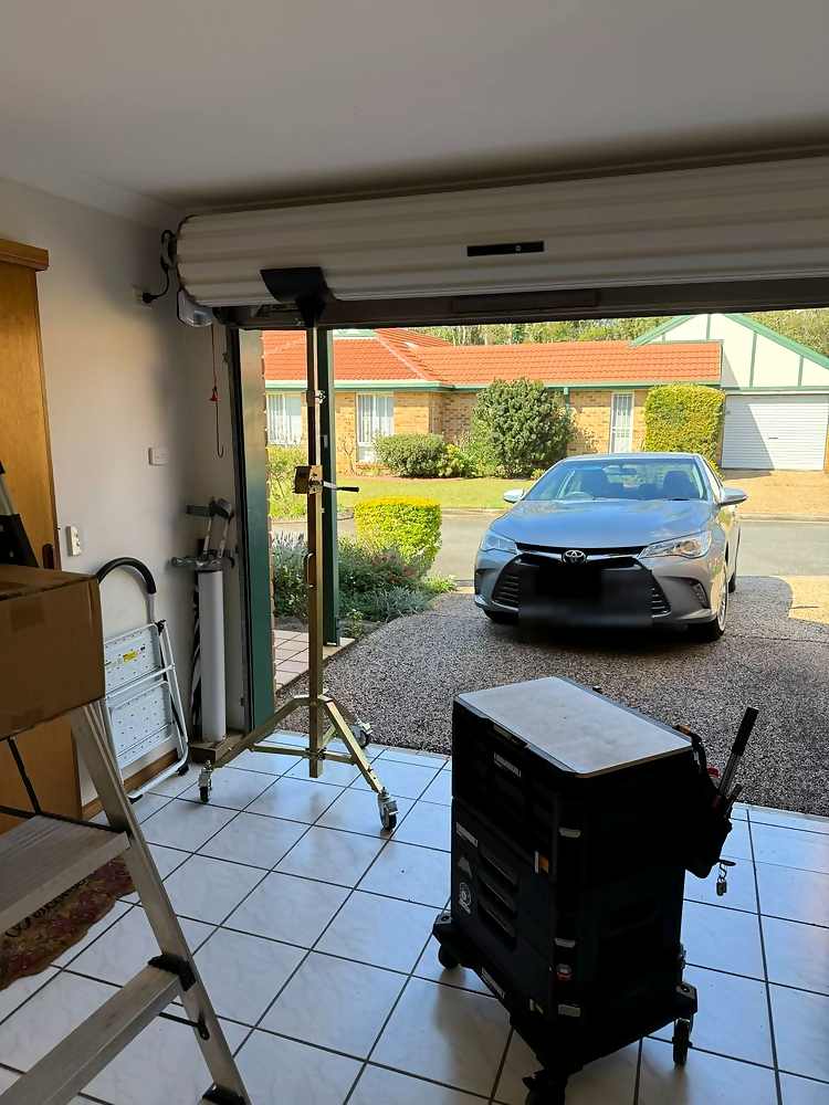 Open roller door looking out to the driveway of a home in Boondall, Brisbane