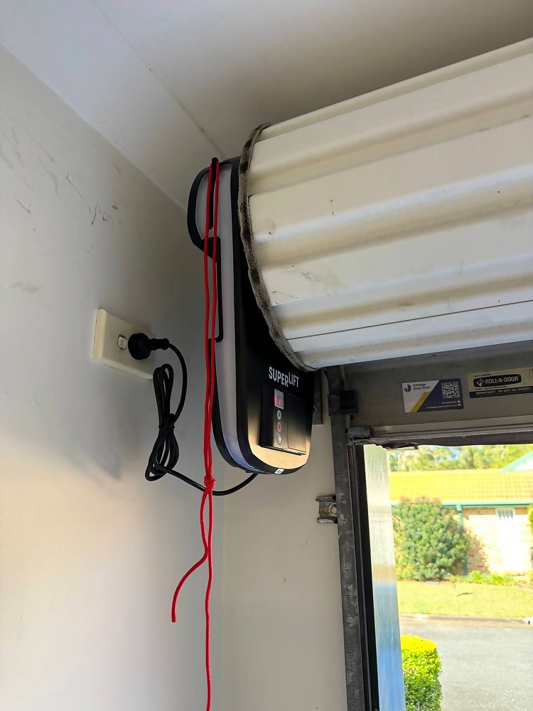 Superlift roller door motor with control panel mounted beside the door in Boondall, Brisbane